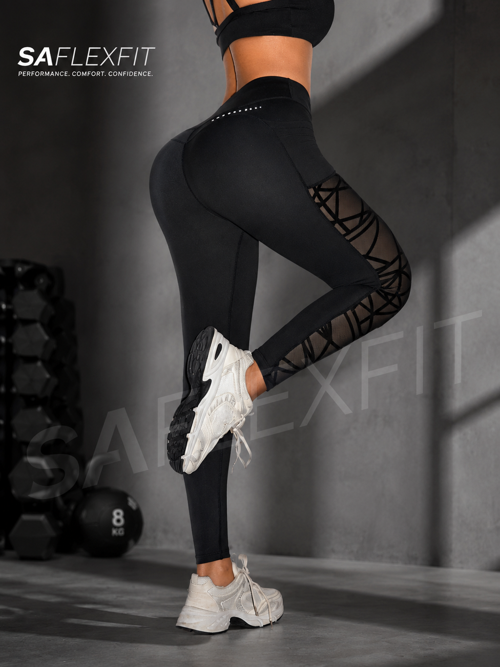 SAflexfit black sculpting leggings with mesh detail — back view showing lift and contour, women's gym tights
